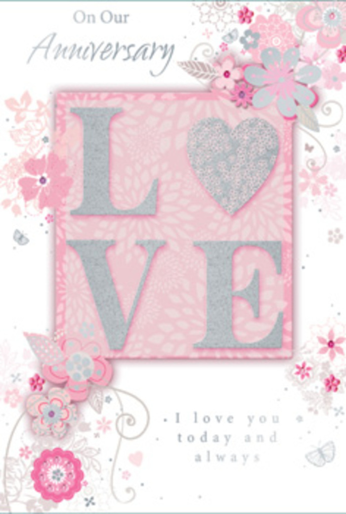 Displayed in the photograph is a romantic anniversary card whose design evokes the warmth of a sunlit room in Noak Hill where love is quietly celebrated each day. The focal point is the word LOVE, beautifully printed in raised lettering that has been dusted with a fine, frosted glitter. This tactile finish makes the letters appear almost sculpted, as if they were carefully cut from sparkling paper and laid onto the card by hand. The glitter softens and diffuses the light, creating delicate highlights that dance across the surface when viewed from different angles. Surrounding this central word, a constellation of wispy, hand-drawn blooms drifts along the edges and corners. The flowers are painted in soft tones of blush, lilac, and creamy ivory, their petals outlined with the lightest touch, reminiscent of the first sketch a florist might make when planning a bespoke anniversary arrangement for a Noak Hill couple. Filigree lines wind between the blossoms, forming slender leaves, graceful curls, and occasional, almost-secret butterfly motifs that suggest quiet movement and the gentle flutter of affection. The background is a calm pink wash, smooth and even, offering a serene canvas for the detailed artwork. Nestled beneath the main design, the message I love you today and always is set in an understated yet graceful typeface, the letters gently spaced to invite a pause of reflection. Everything about the layout-from the placement of the flowers to the curve of the script-feels intentional, like stems placed one by one into a hand-tied bouquet chosen from Florist Noak Hill to say you are cherished, now and always.
